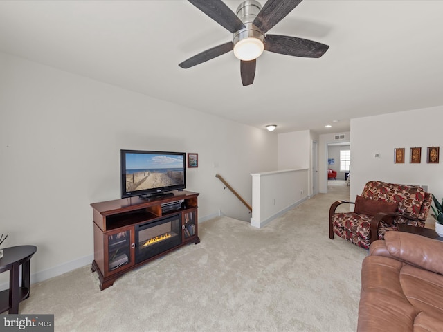 carpeted living room featuring visible vents and baseboards