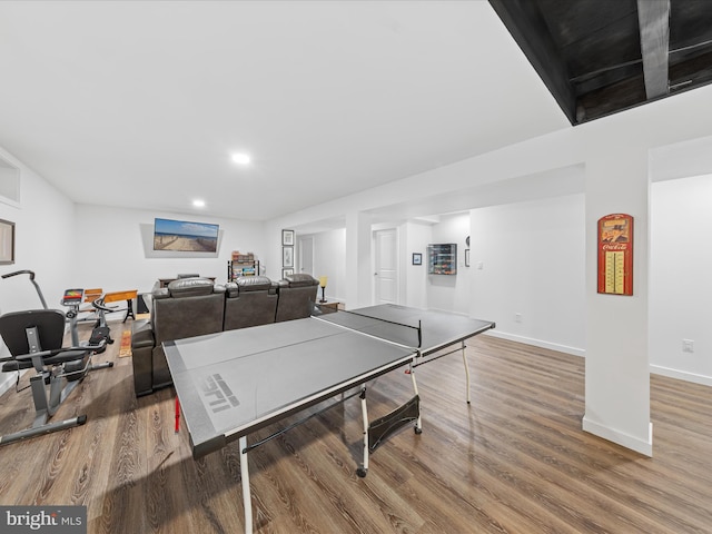 game room with recessed lighting, baseboards, and wood finished floors