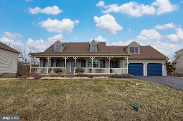 view of front facade with aphalt driveway, covered porch, an attached garage, and a front yard