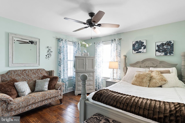 bedroom with dark wood finished floors and ceiling fan