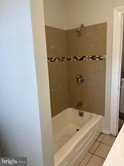 bathroom featuring tile patterned floors and shower / bath combination