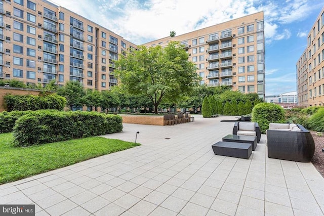 view of community featuring outdoor lounge area and a patio