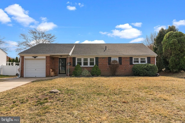 single story home featuring a garage, brick siding, driveway, and fence