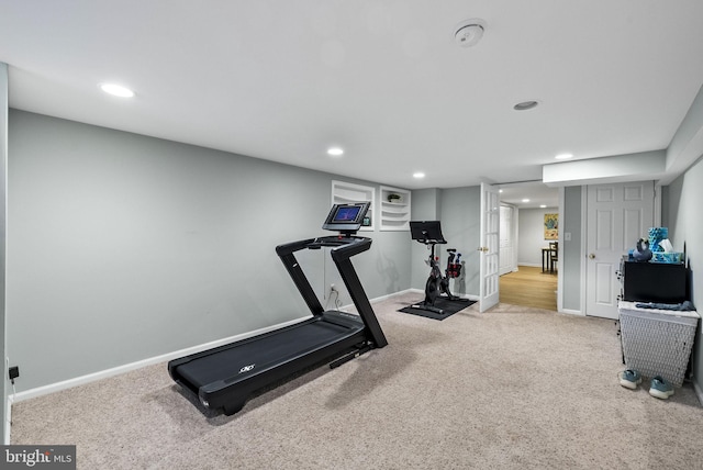 exercise room featuring recessed lighting, baseboards, and carpet flooring