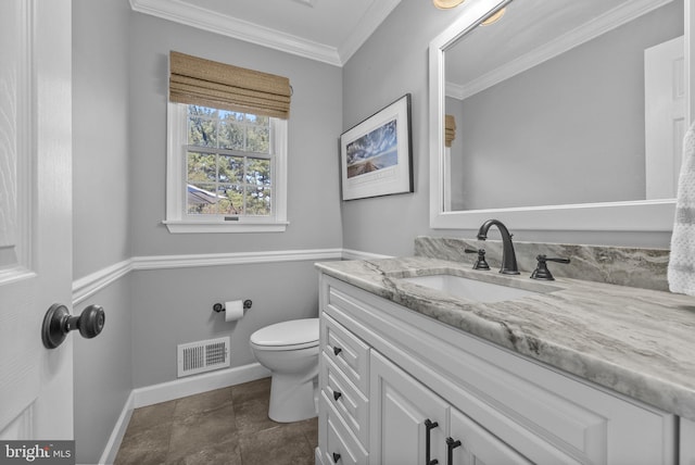 bathroom with visible vents, baseboards, toilet, ornamental molding, and vanity