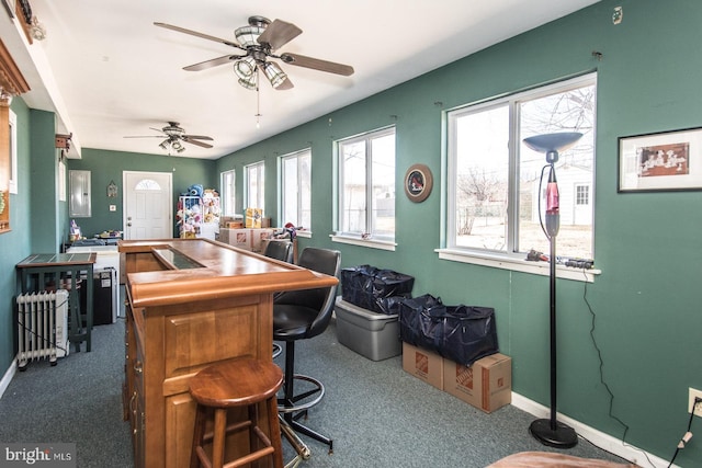 bar with carpet and baseboards