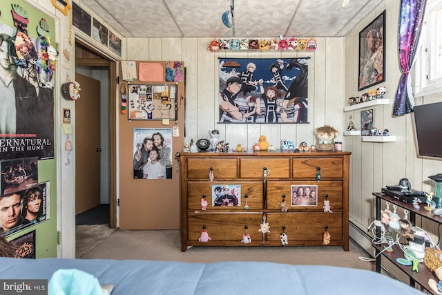 bedroom with wooden walls