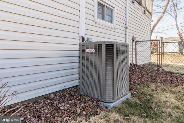 exterior details with cooling unit and fence