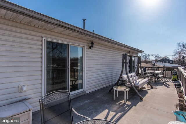 view of patio featuring outdoor dining space