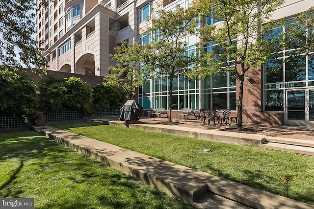 exterior space with a yard and fence