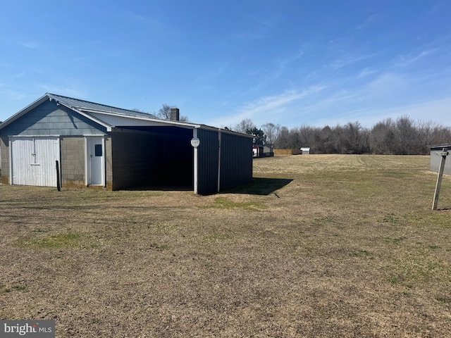 exterior space featuring an outbuilding