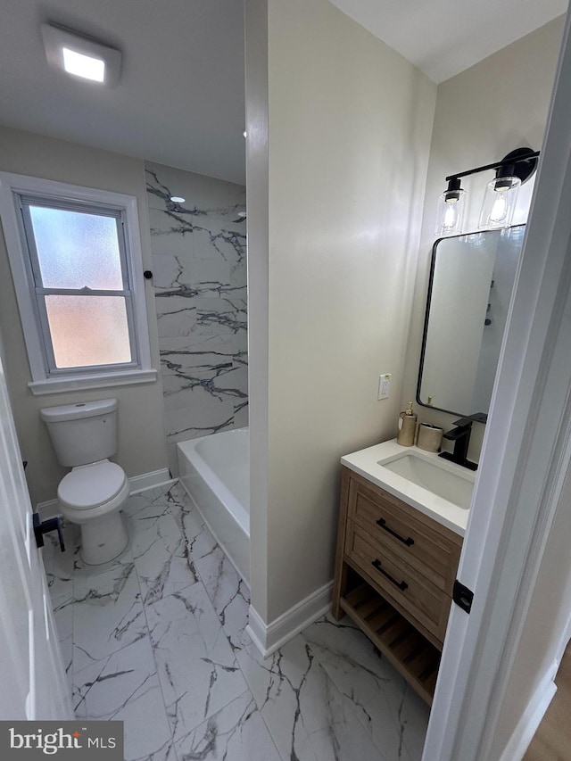 full bathroom with vanity, toilet, baseboards, and marble finish floor