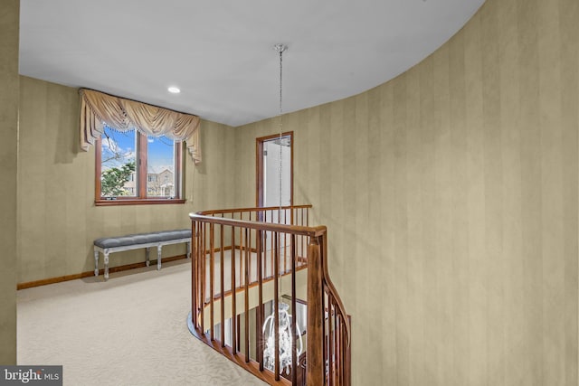 corridor with an upstairs landing, carpet flooring, recessed lighting, and baseboards