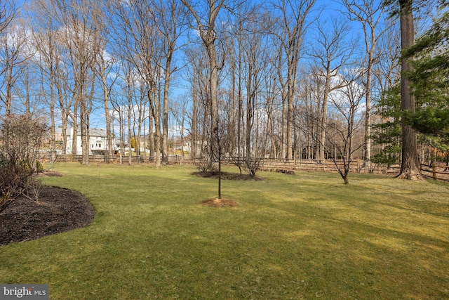 view of yard featuring fence