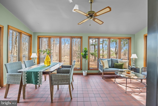 sunroom / solarium with vaulted ceiling and ceiling fan