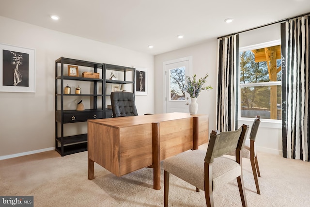 home office with recessed lighting, light colored carpet, and baseboards