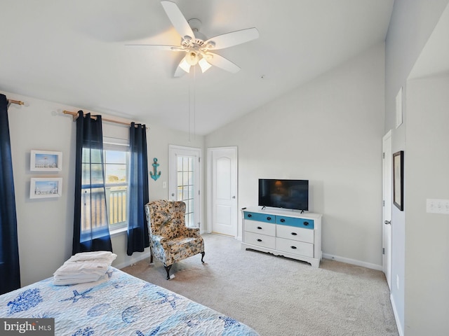 carpeted bedroom featuring baseboards, ceiling fan, and vaulted ceiling