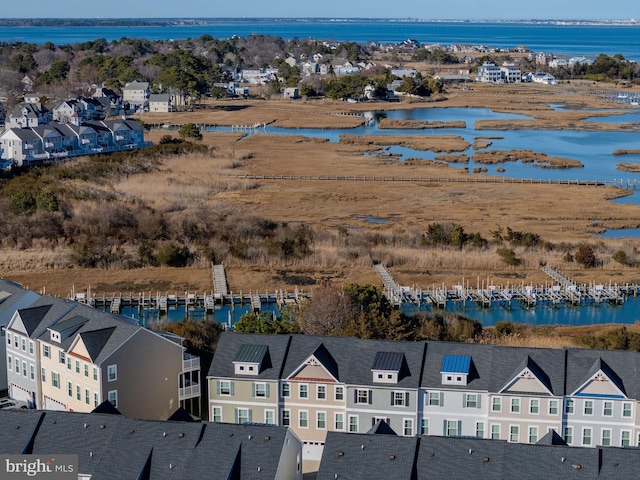 aerial view featuring a residential view and a water view