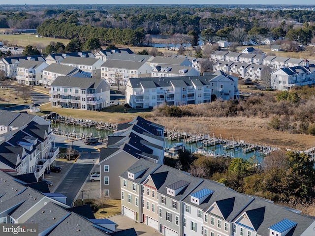 bird's eye view with a residential view and a water view