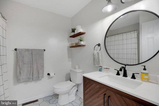 full bath featuring tile patterned floors, visible vents, toilet, and vanity