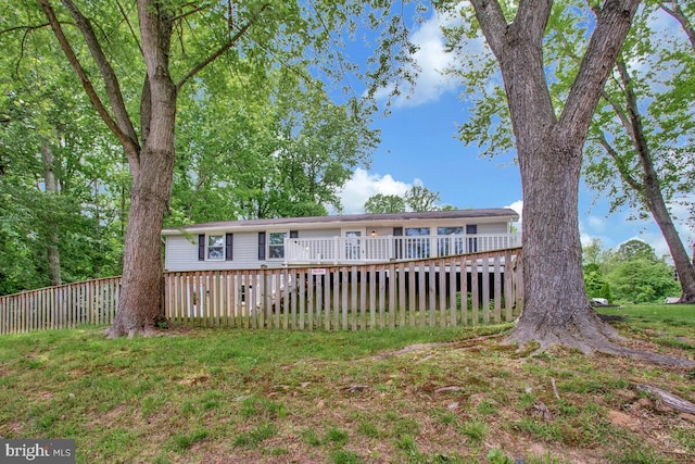 3719 3rd St, North Beach, MD 20714 - back of house featuring a wooden deck