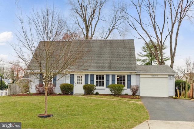 cape cod-style house with aphalt driveway, an attached garage, a front lawn, and fence