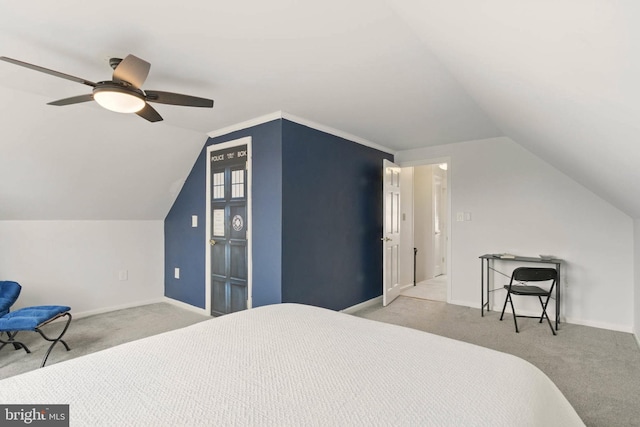 bedroom with ceiling fan, baseboards, carpet, and vaulted ceiling