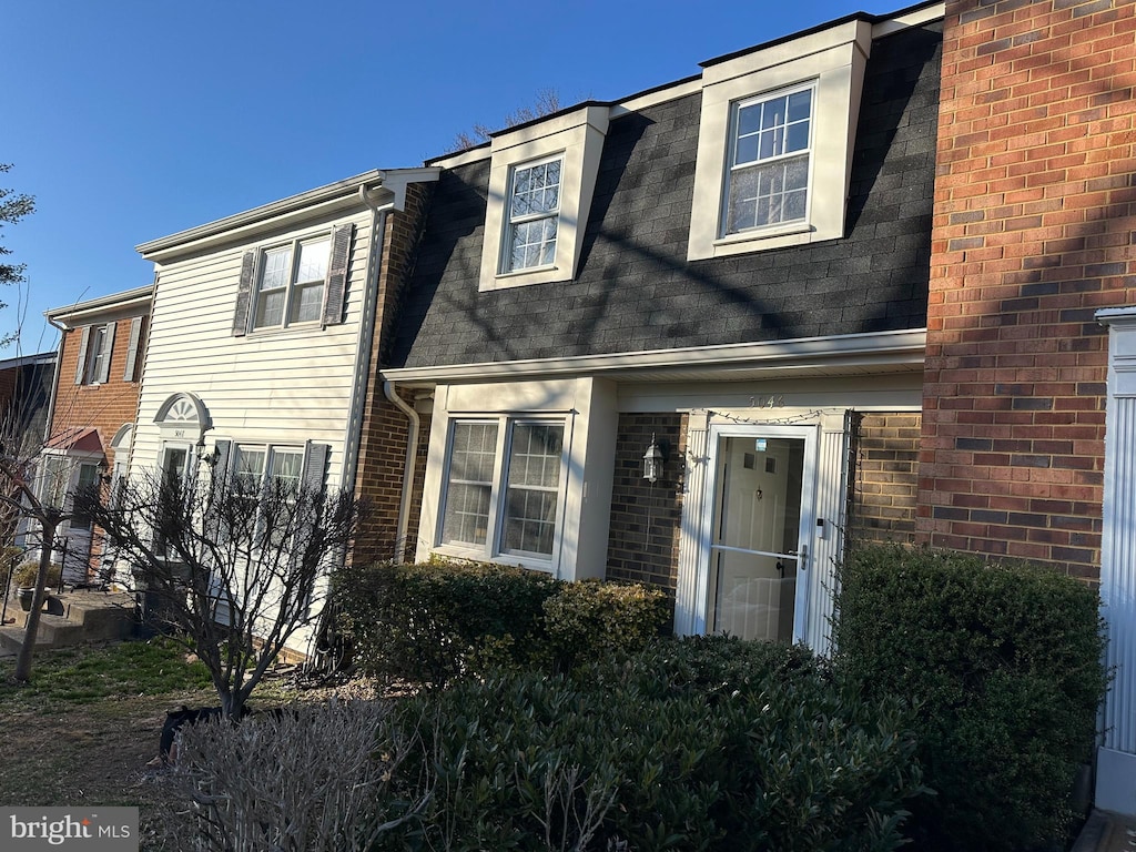 multi unit property featuring brick siding