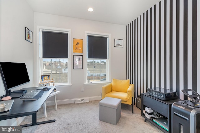 carpeted office space featuring recessed lighting, baseboards, and visible vents