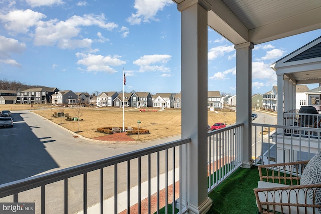 balcony featuring a residential view