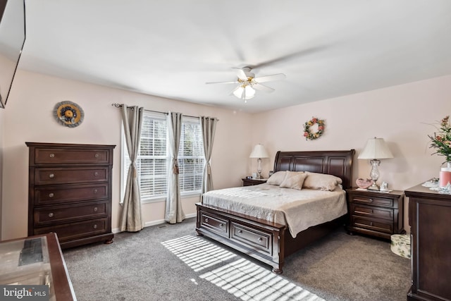 bedroom featuring a ceiling fan, carpet, and baseboards