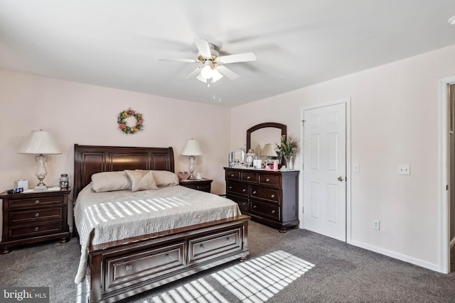 carpeted bedroom with baseboards and ceiling fan