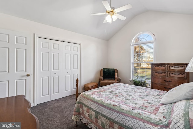 bedroom featuring vaulted ceiling, carpet flooring, a ceiling fan, and a closet