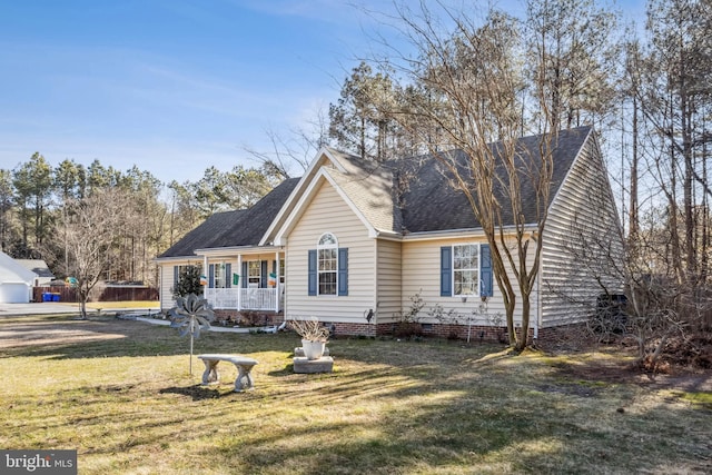 view of front of home featuring crawl space, roof with shingles, a porch, and a front yard