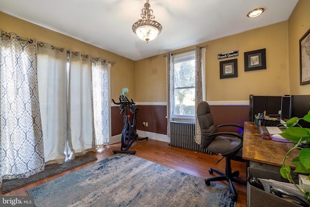 office with wood finished floors and baseboards