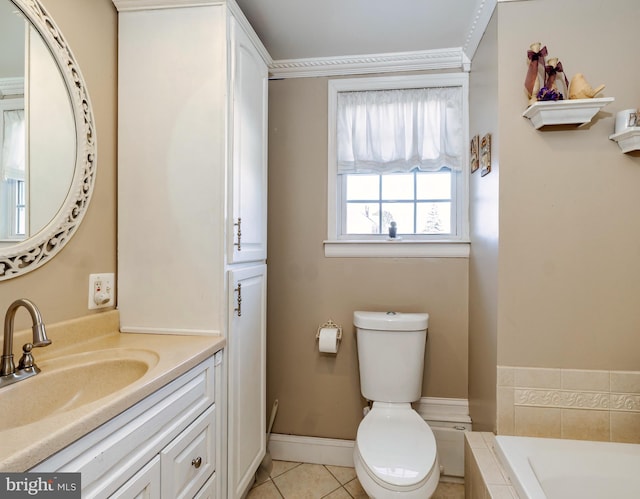 full bathroom featuring a tub, baseboards, toilet, tile patterned floors, and vanity