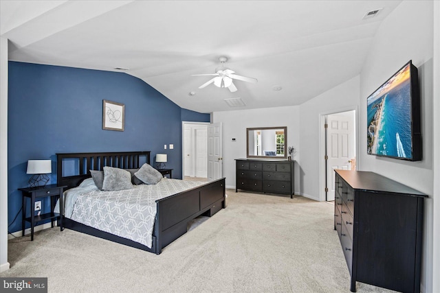 bedroom with a ceiling fan, baseboards, visible vents, lofted ceiling, and light carpet