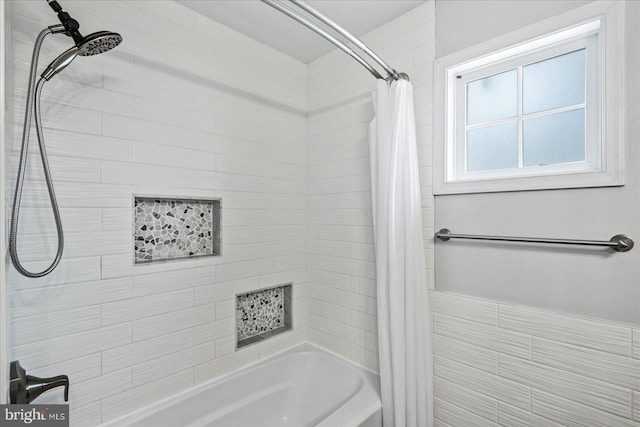 bathroom with shower / tub combo