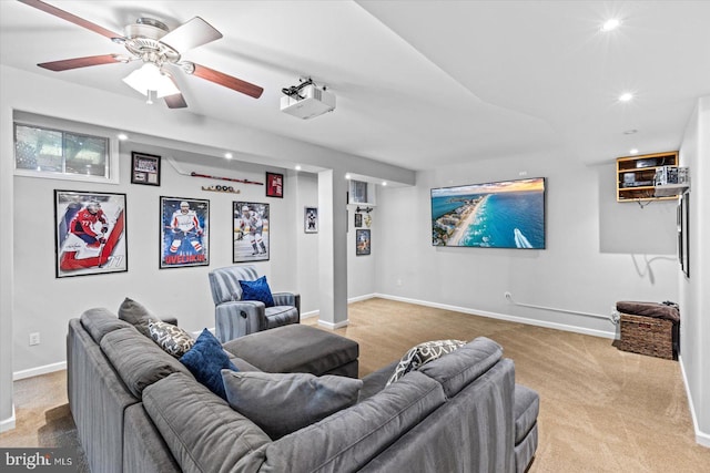 living area featuring recessed lighting, baseboards, ceiling fan, and carpet flooring