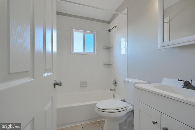 bathroom featuring vanity, tile patterned floors, toilet, and bathing tub / shower combination