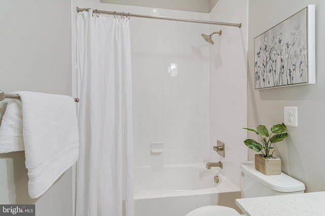 full bathroom featuring vanity, toilet, and shower / tub combo with curtain