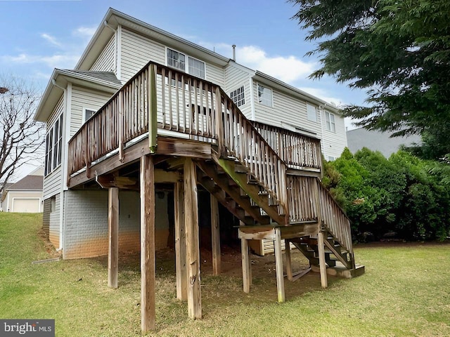 back of house featuring stairway, a yard, and a wooden deck