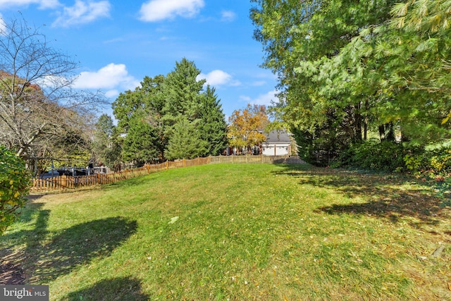 view of yard with fence