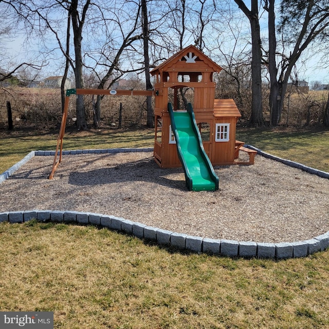 view of playground featuring a yard