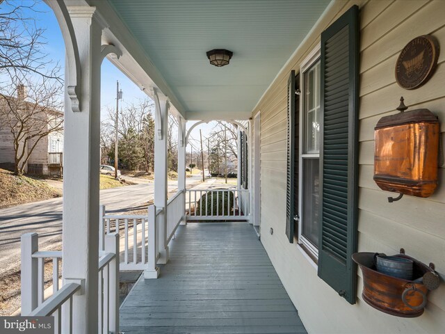 deck with covered porch