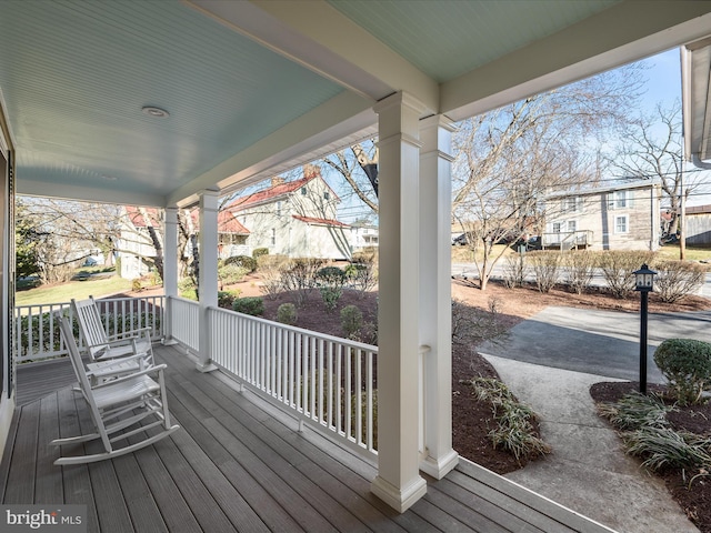 wooden deck featuring a porch