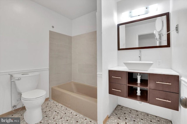 full bath with tile patterned flooring, toilet, and vanity