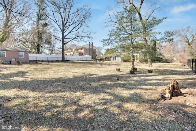 view of yard featuring fence