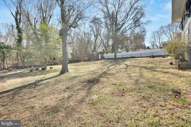 view of yard with fence