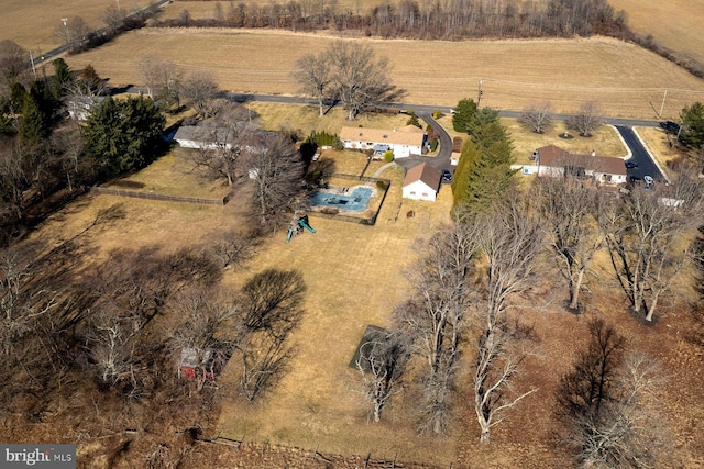 birds eye view of property featuring a rural view